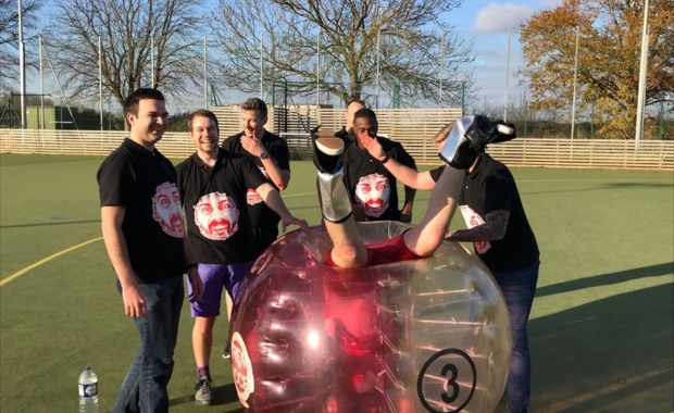 Lads playing bubble football